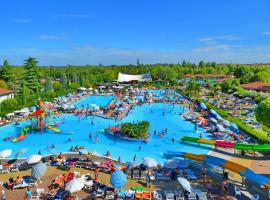 Camping Bella Italia, feriebolig ved stranden i Peschiera del Garda