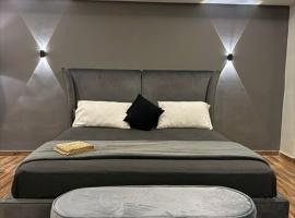 Grey as Smoke -1BHK Modern Condo - Self Checkin, lejlighed i Rawalpindi