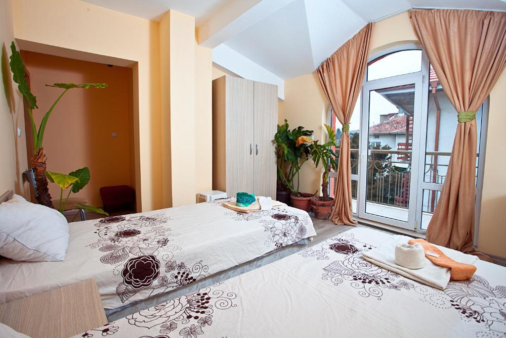 Familly hotel Randevu房間的床