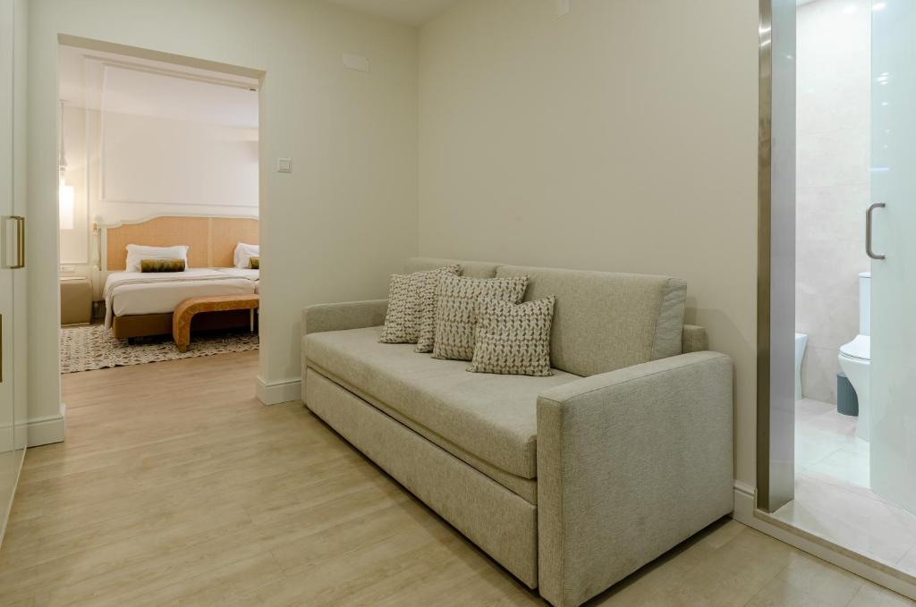 Uma cama ou camas num quarto em Hotel Borges Chiado