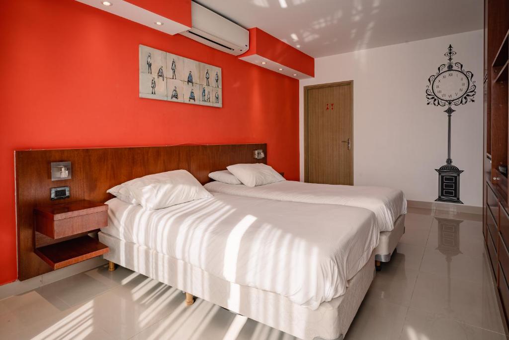 Katil atau katil-katil dalam bilik di Shoshana Hotel Boutique
