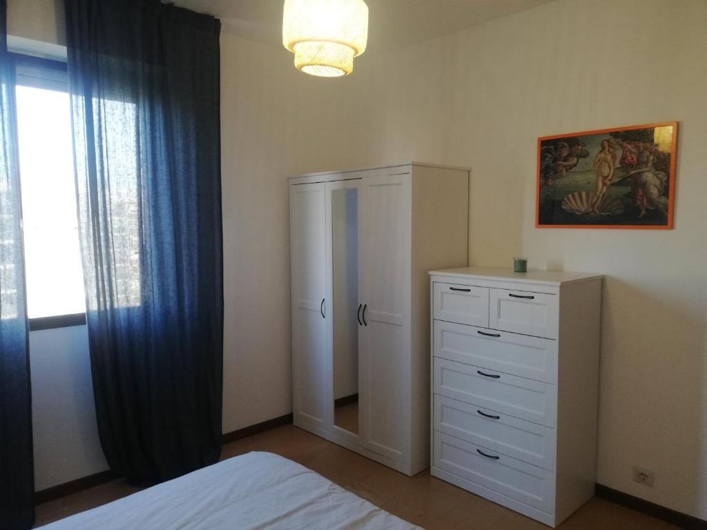 Tempat tidur dalam kamar di Panorama