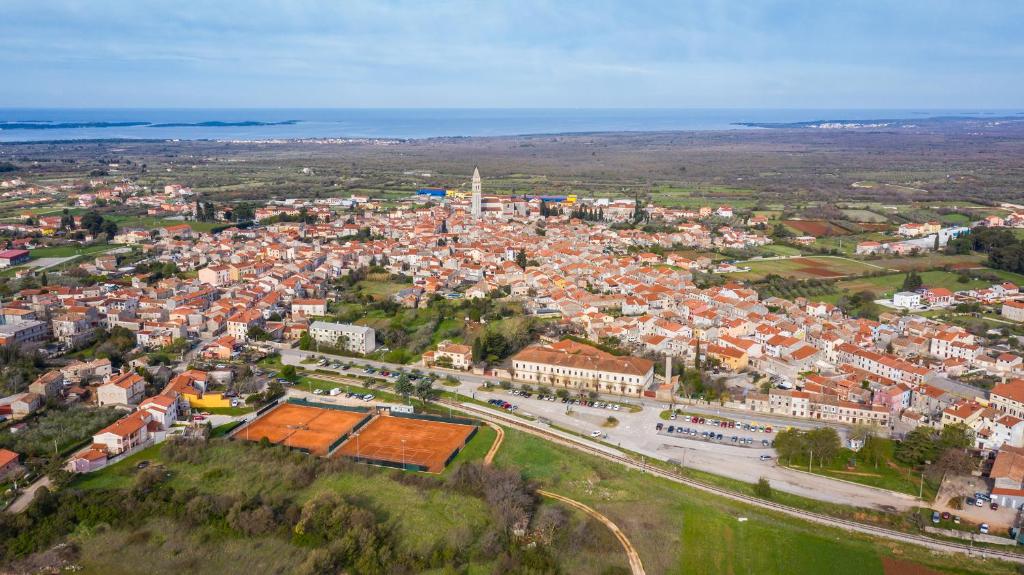 an aerial view of a city with buildings at Amazing private villa with outdoor swimming pool in Vodnjan in Vodnjan