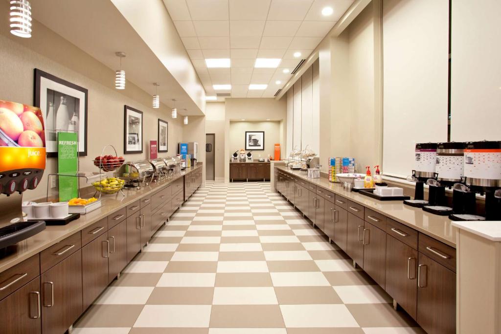 a large kitchen with long counters at Hampton Inn & Suites - Minneapolis/Downtown in Minneapolis