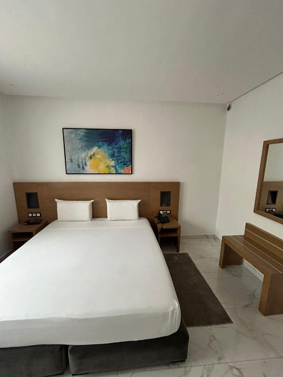 Kama o mga kama sa kuwarto sa Twin Hotel Tanger