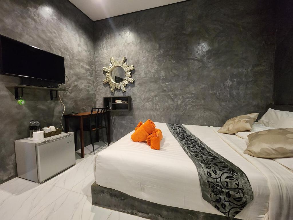 Tempat tidur dalam kamar di La Chambre Boutique @ Ko Lanta
