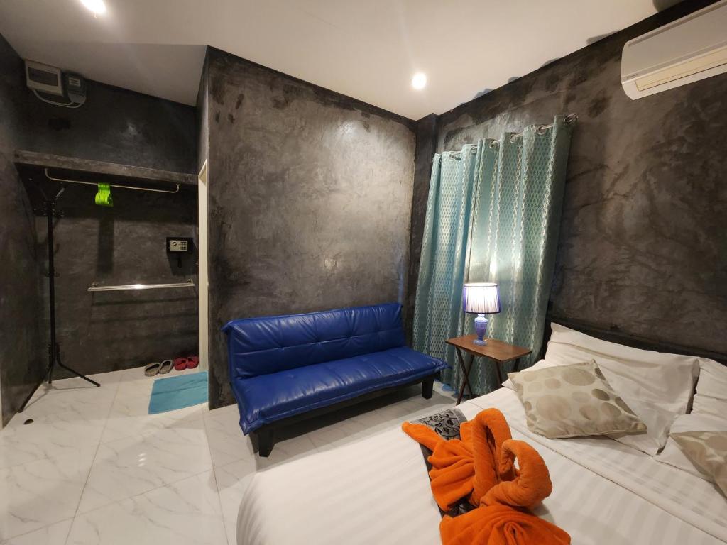 Tempat tidur dalam kamar di La Chambre Boutique @ Ko Lanta