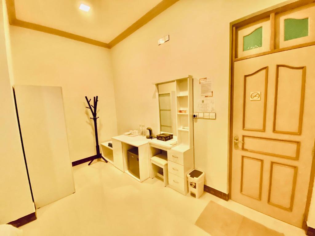 Vannituba majutusasutuses Oasis Village Fenfushi, Maldives