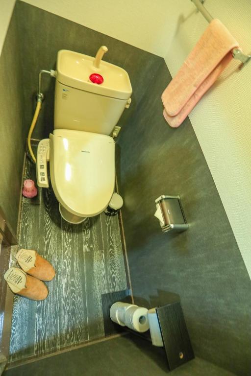a bathroom with a toilet in a room at Fushimi Yokkusu Building 10F - Vacation STAY 16301 in Nagoya