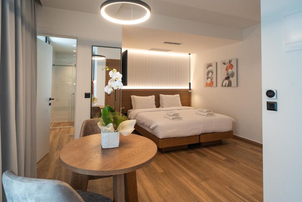Krevet ili kreveti u jedinici u okviru objekta Volos Inn Hotel