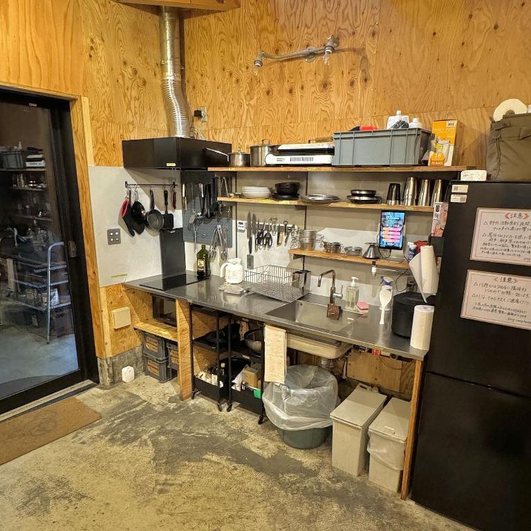 a kitchen with a large counter in a room at SNUG CAMP HOUSE - Vacation STAY 98114v in Okubo