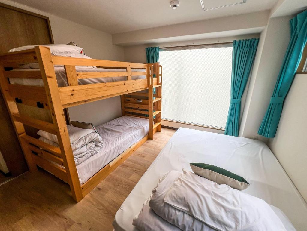 Una cama o camas en una habitación de Hostel In Kyoto Gion - Vacation STAY 13412v