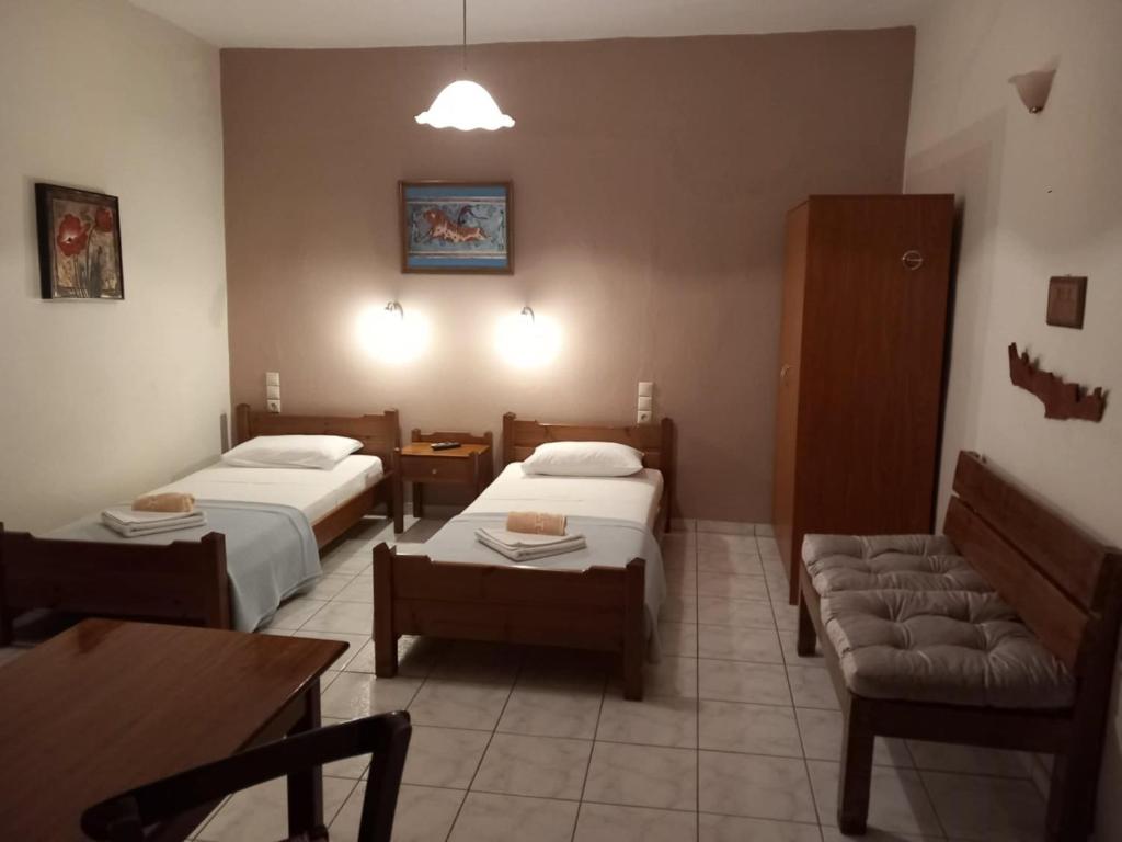 Cama ou camas em um quarto em Villa Orestis