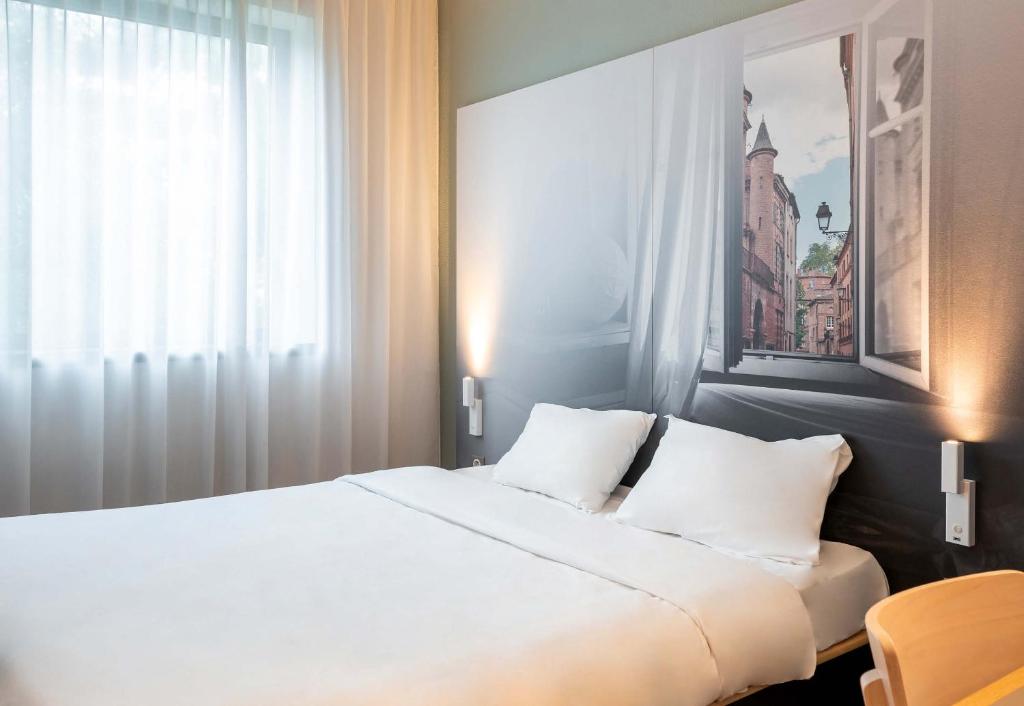 B&B HOTEL Toulouse Basso Cambo 객실 침대