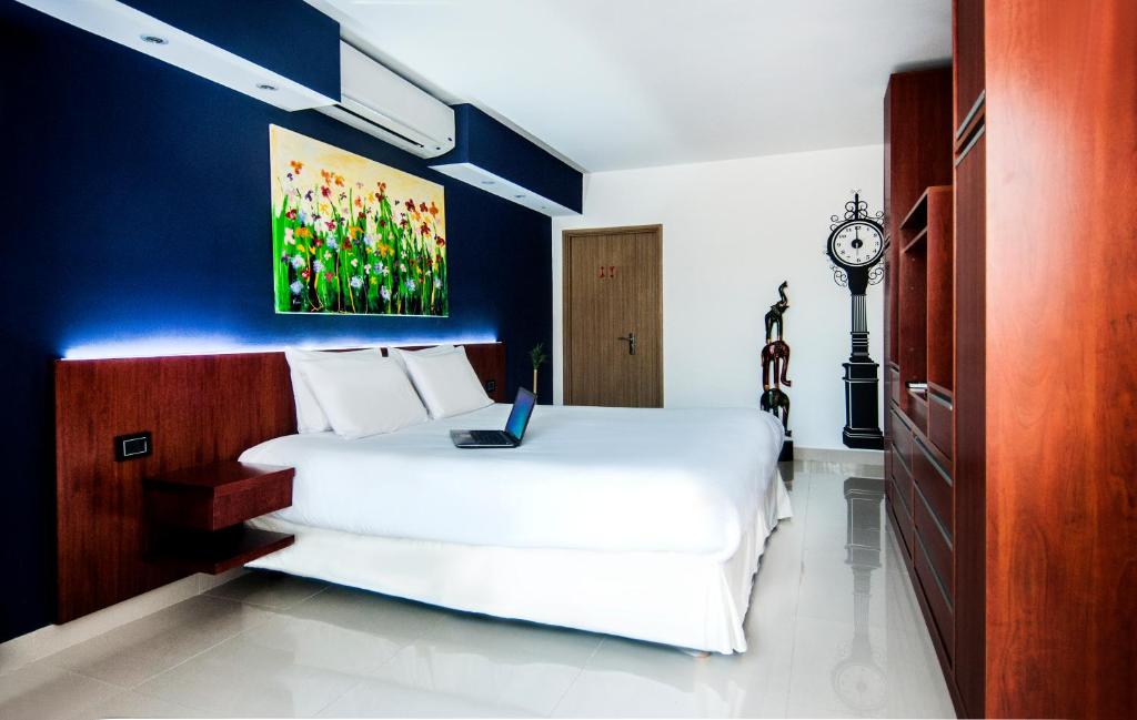 Katil atau katil-katil dalam bilik di Shoshana Hotel Boutique