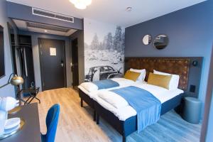 Voodi või voodid majutusasutuse The Verdandi Hotel toas