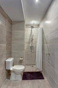 Ванна кімната в Chalet Apartments