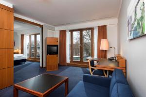 Sjónvarps- og/eða afþreyingartæki á Seminaris Hotel Potsdam Griebnitzsee