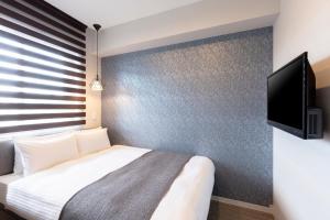 M's Hotel Gojo Naginatagiri tesisinde bir televizyon ve/veya eğlence merkezi +26 fotoğraf