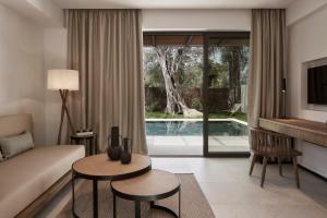 Телевизия и/или развлекателен център в The Olivar Suites