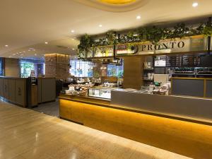 a dining area of a restaurant in a building at Shibuya Tobu Hotel in Tokyo