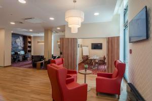 TV at/o entertainment center sa Hampton by Hilton Frankfurt City Centre +22 photo