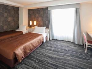 Krevet ili kreveti u jedinici u objektu J - HOTEL RINKU - Vacation STAY 42900v