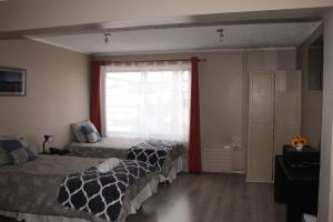 Una cama o camas en una habitación de HOTEL LOYOLA