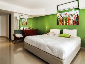 Katil atau katil-katil dalam bilik di Shoshana Hotel Boutique