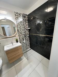 O baie la Maple Tree Budget Apartments