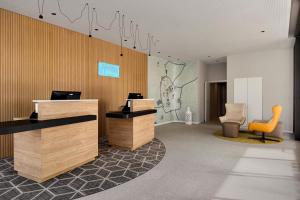 Televisi dan/atau pusat hiburan di Holiday Inn Express Évora by IHG
