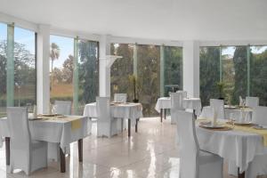 Ресторант или друго място за хранене в Trans International Hotel