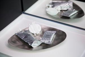 a display case with two plates with food on it at The Z Hotel Leicester Square in London
