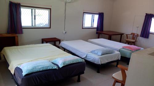 Кровать или кровати в номере Bluepango Guest House