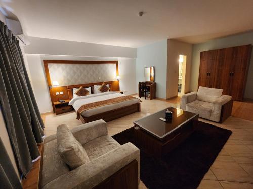 Katil atau katil-katil dalam bilik di Aquavista Hotel & Suites