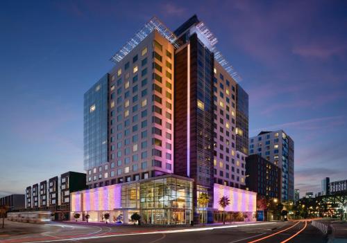 a rendering of a tall building in a city at LUMA Hotel San Francisco in San Francisco