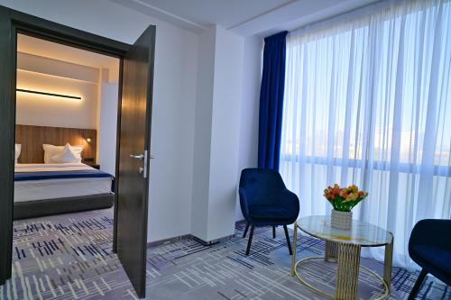 Hotel Sir Royal 객실 침대