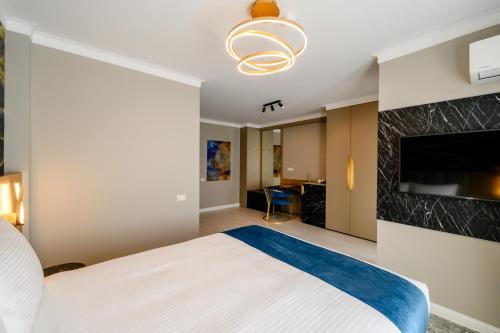 Elitte Inn & Suites 객실 침대