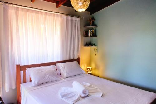 Cama ou camas em um quarto em Casa Pensa no Condomínio Pipa Beleza