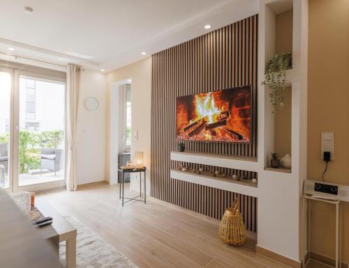 Sjónvarps- og/eða afþreyingartæki á Schöne Wohnung mit Terrasse Nähe Airport