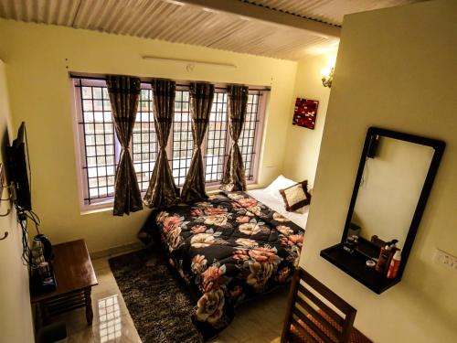 A bed or beds in a room at BOB's Haven Bungalow