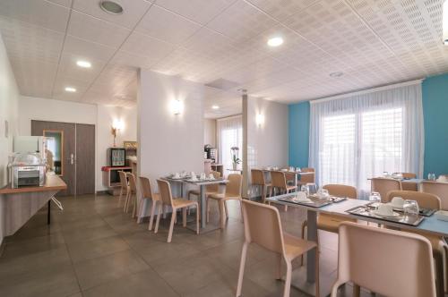 Restorāns vai citas vietas, kur ieturēt maltīti, naktsmītnē Appart'City Confort Perpignan Centre Gare